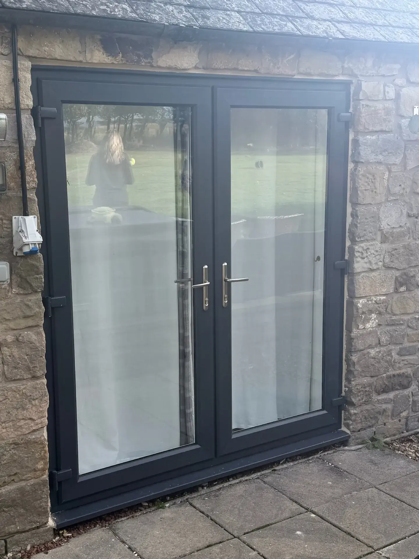 Another set of the anthracite grey French doors, in the same stone cottage