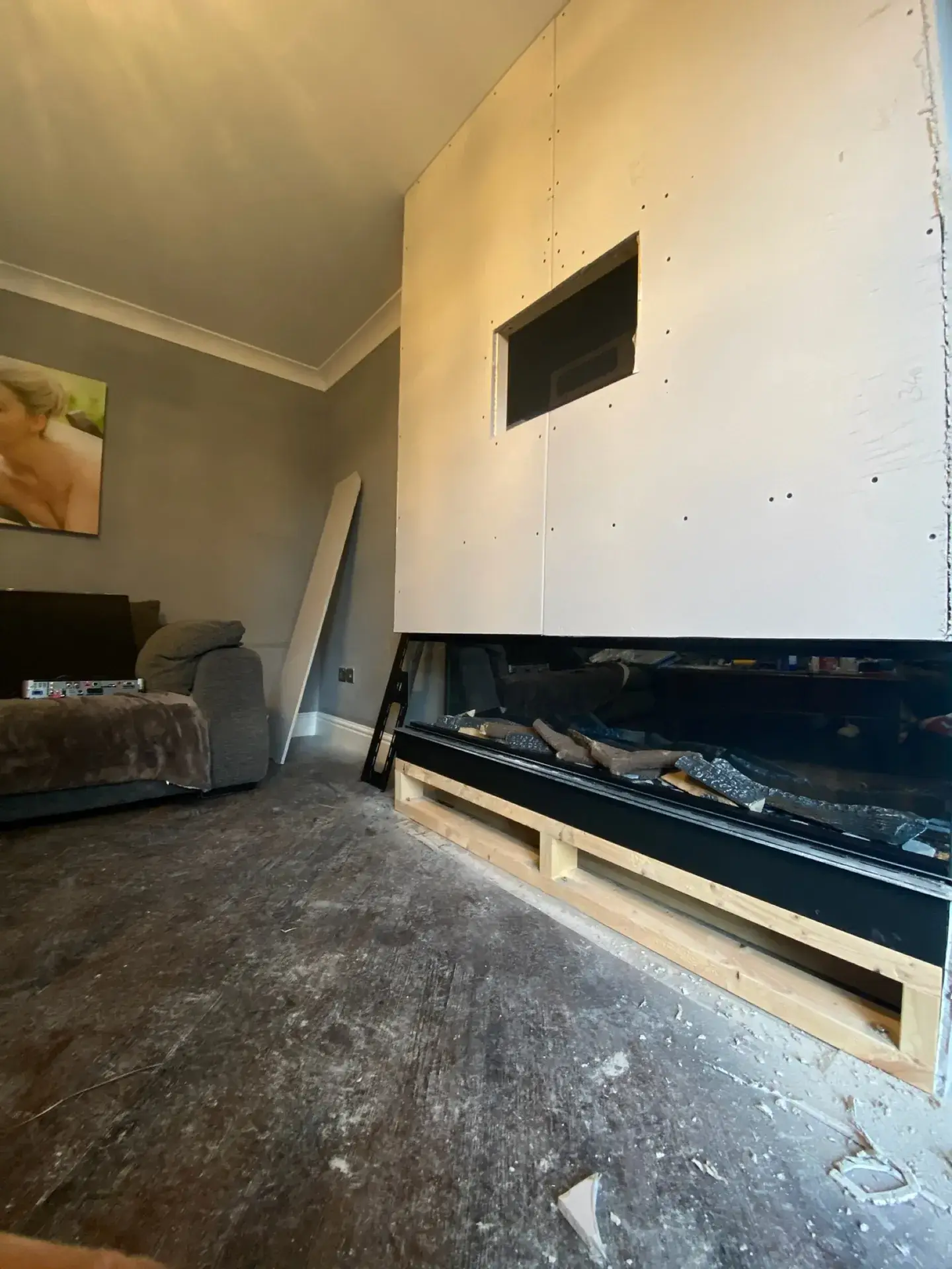 A new chimney breast built out around an inset electric fire
